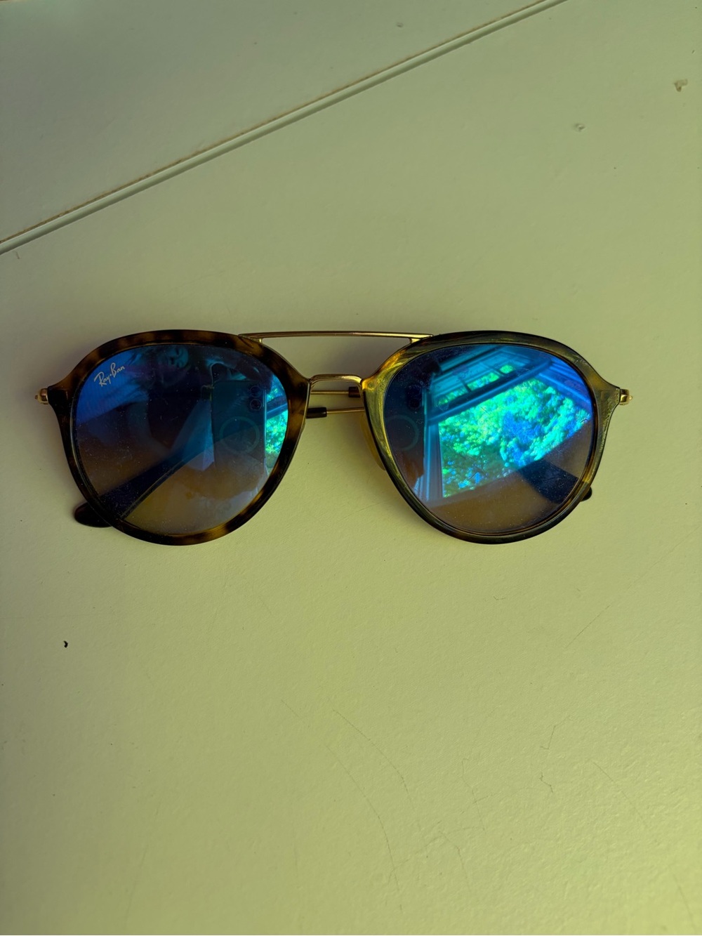 Ray-Ban Tortoise Frame Sunglasses with Blue Mirrored Lenses